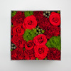 Red flowers in a box flower delivery service in Vilnius Beatričės Gėlių Namai