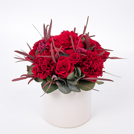 Arrangement with preserved roses and carnations