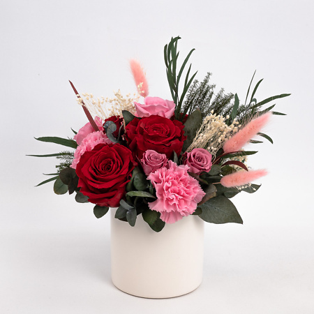 Arrangement with preserved roses and carnations